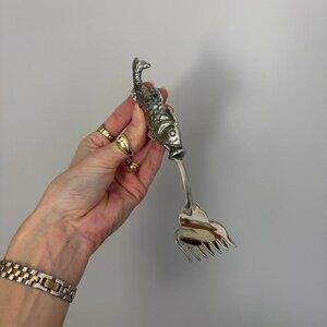 Silver tone metal fish fork